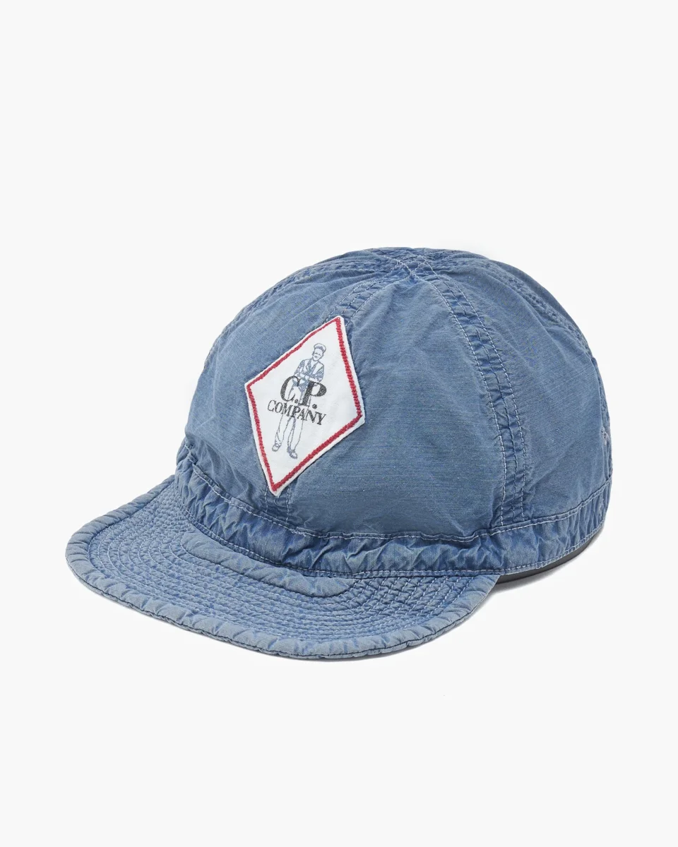 Boné CP Company 50 Fili Indigo Bleached Unisexo
